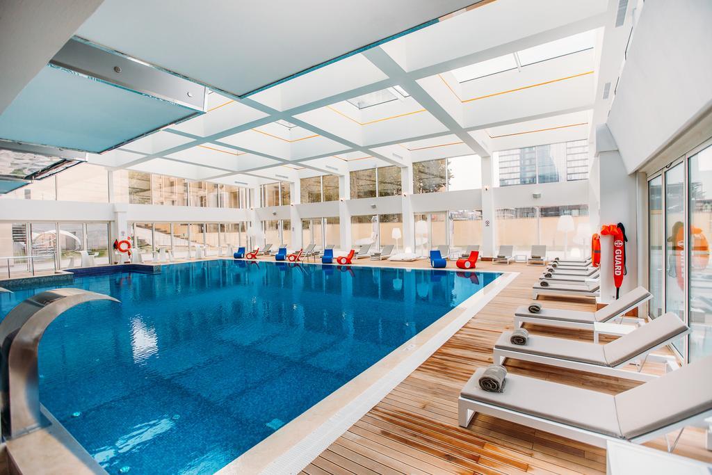 The Biltmore Tbilisi Hotel Bagian luar foto The swimming pool at the hotel