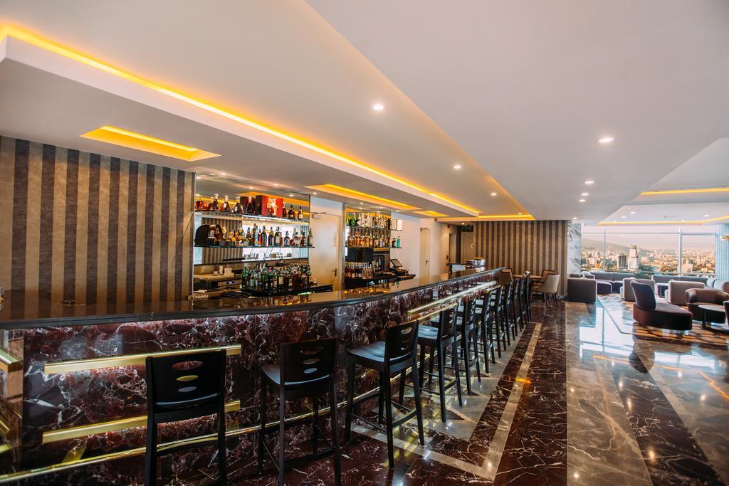 The Biltmore Tbilisi Hotel Bagian luar foto The bar at the lobby